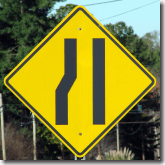 Merging lanes traffic sign.